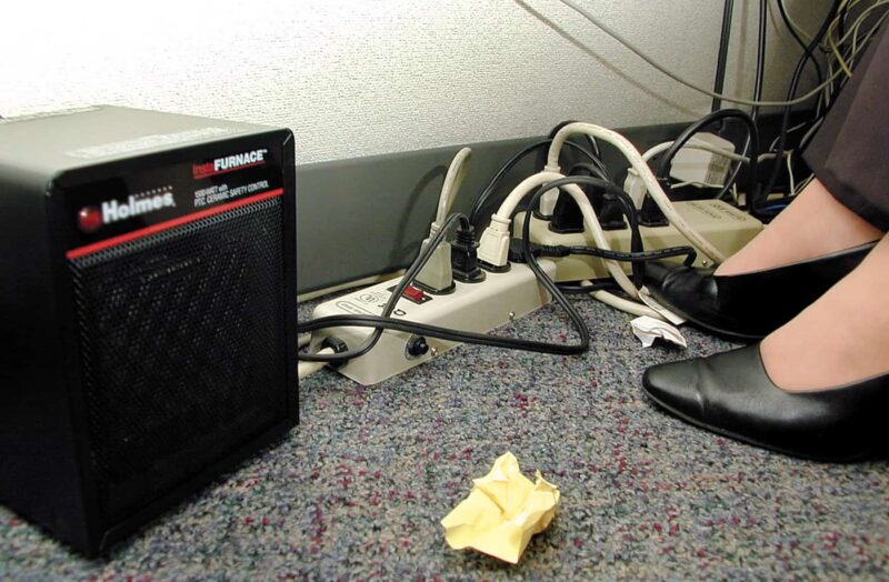 Space Heater with multiple extension cords and surge protectors