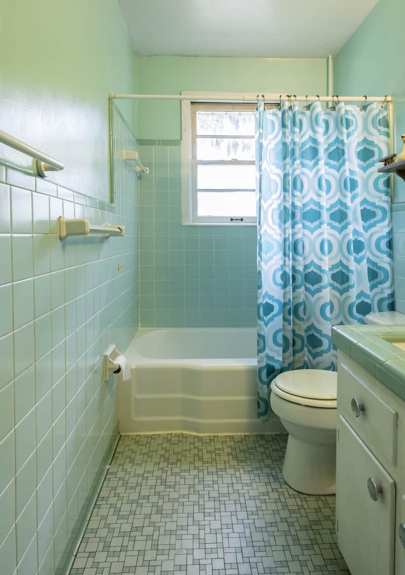 Simple Dated 1950s Bathroom With Green Tile.