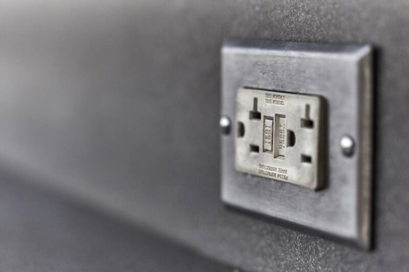 Do you need an electrician to replace or install a GFCI outlet?